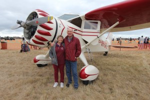 Kevin Bailey and his wife with their Stinson Reliant